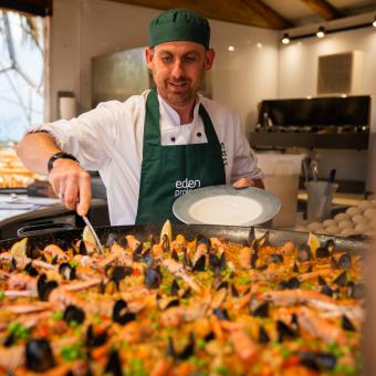 Eden Project chef serving paella